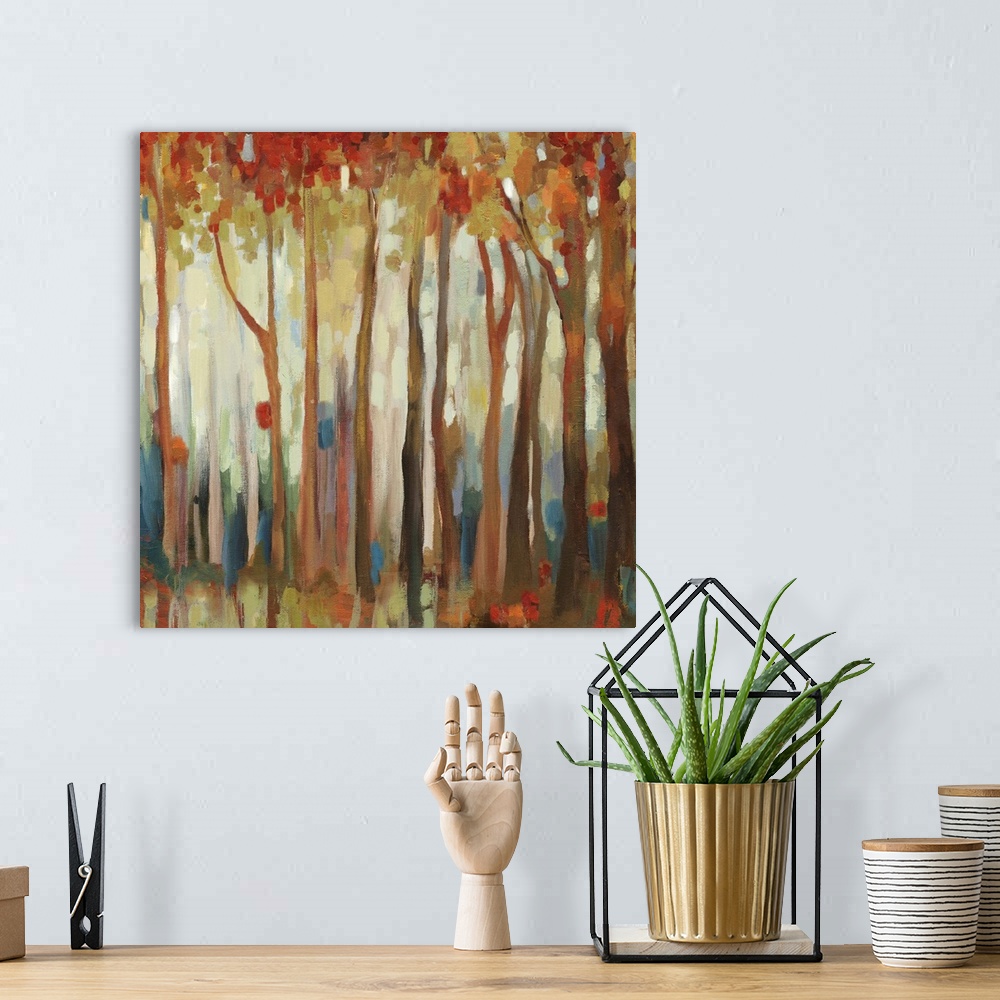 A bohemian room featuring Contemporary home decor artwork of an autumn foliage forest.