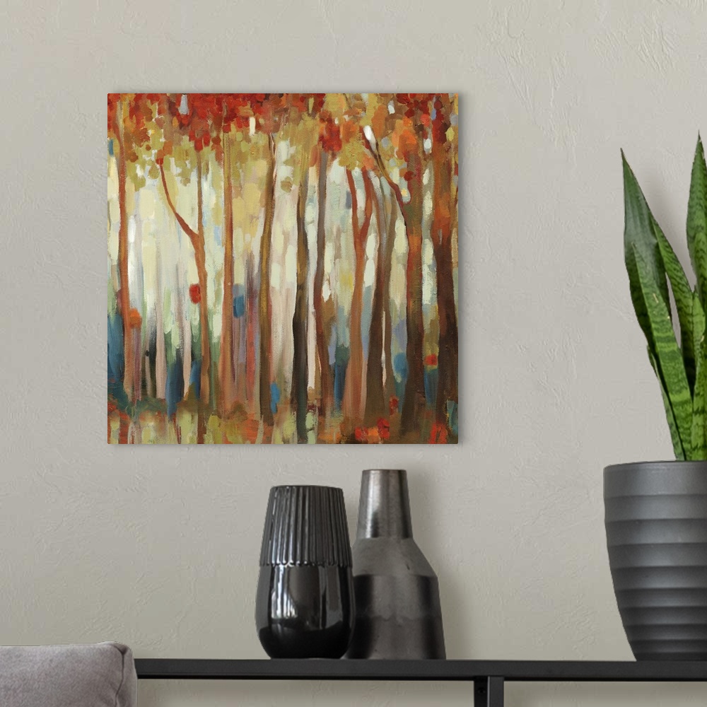 A modern room featuring Contemporary home decor artwork of an autumn foliage forest.