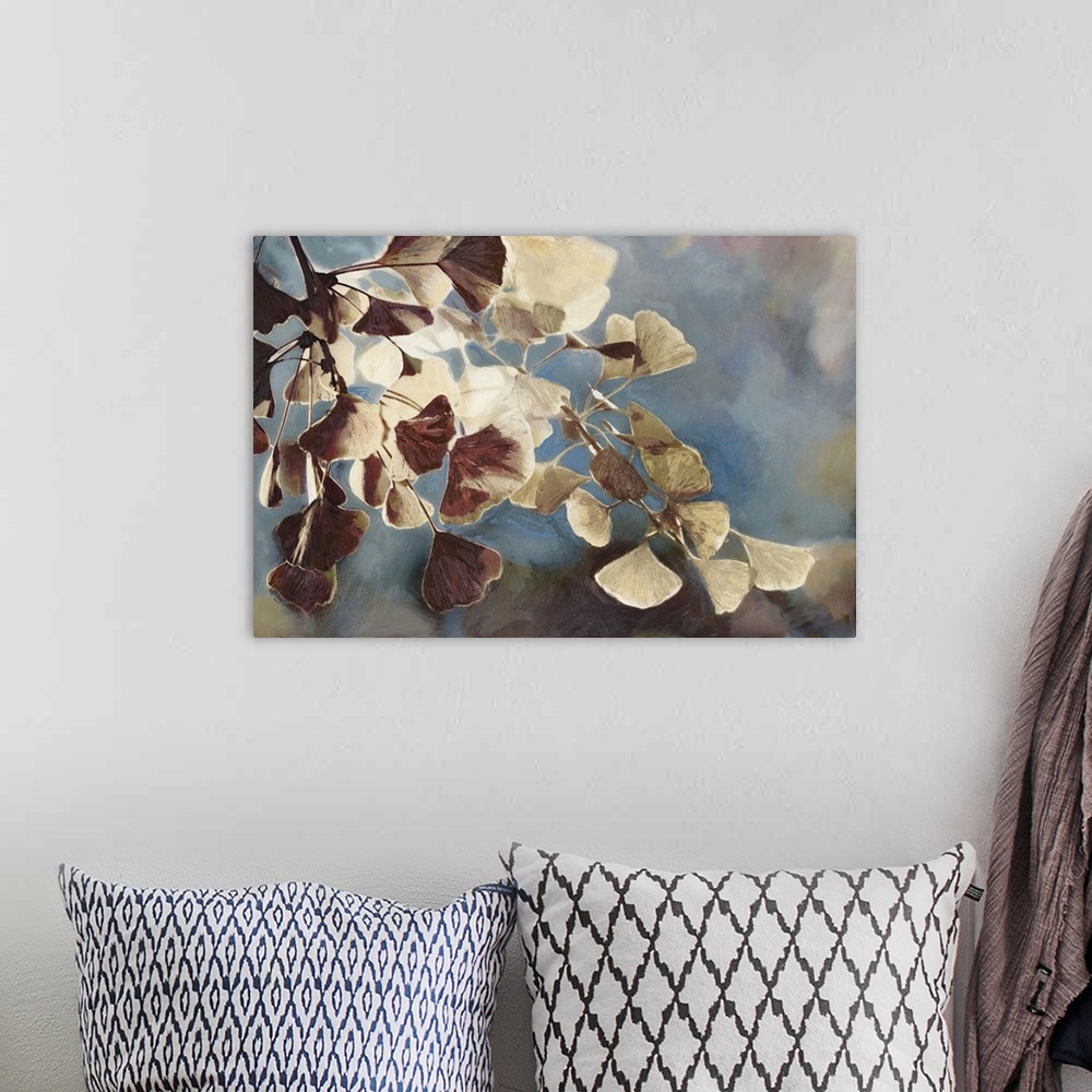 A bohemian room featuring A contemporary painting of leaves on a tree branch against a blue sky.
