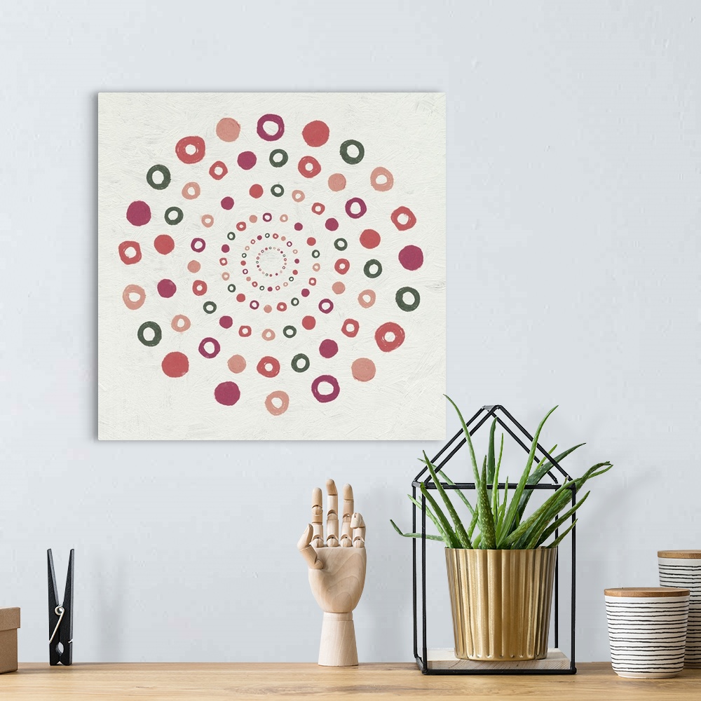 A bohemian room featuring Abstract painting of circles in a spiraled pattern.