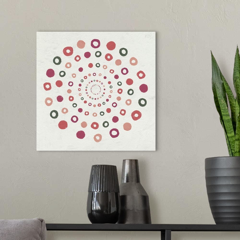 A modern room featuring Abstract painting of circles in a spiraled pattern.
