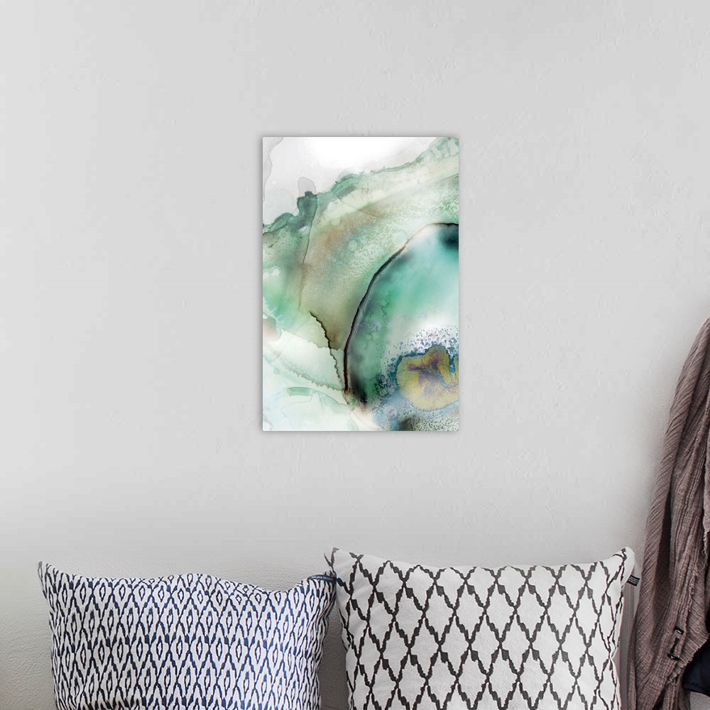 A bohemian room featuring Abstract watercolor artwork of softly blending shades of teal and jade green.