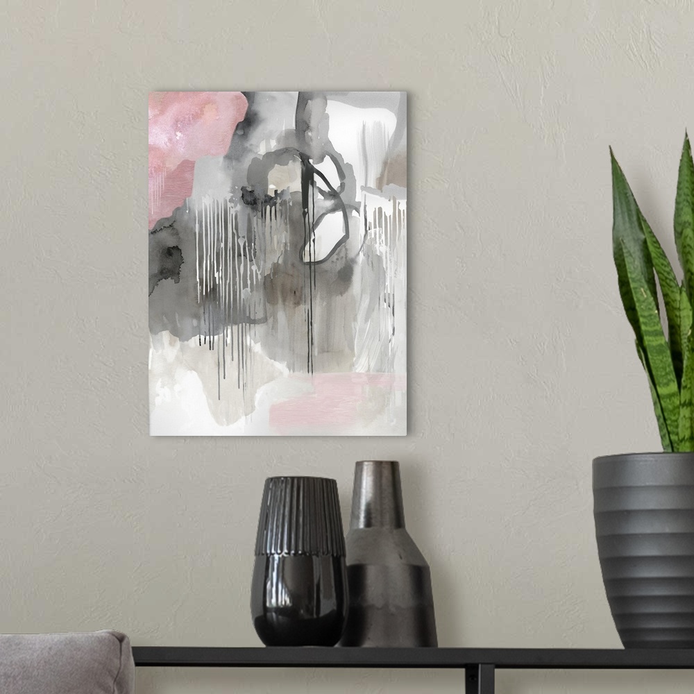 A modern room featuring Vertical abstract painting in shades of gray with accents of pink.