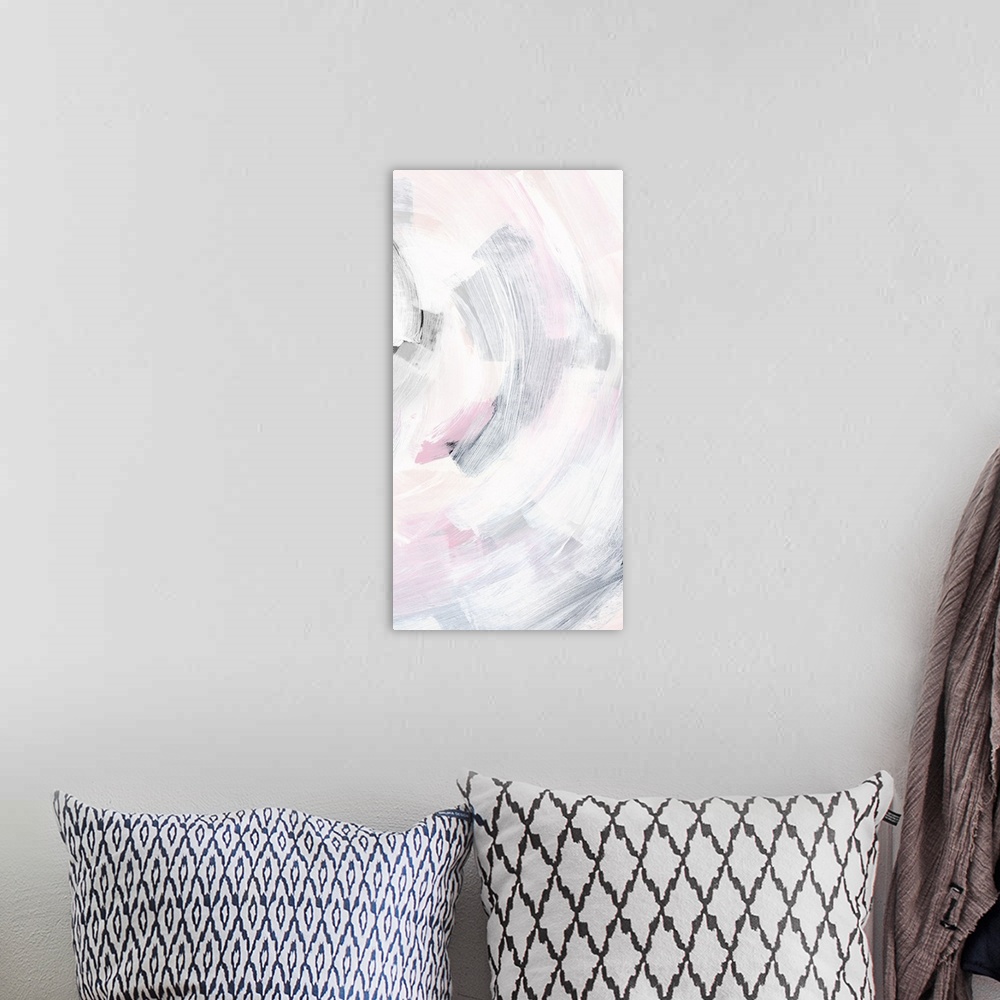 A bohemian room featuring Long vertical painting of curved brush strokes of white washed colors of pink, white and gray.