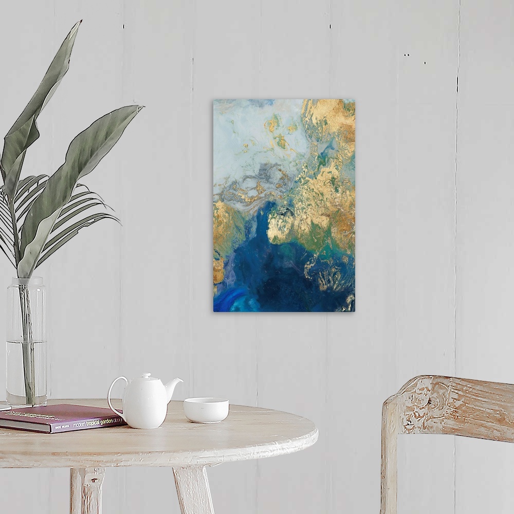 A farmhouse room featuring Abstract painting in blue and gold, resembling swirling waves.