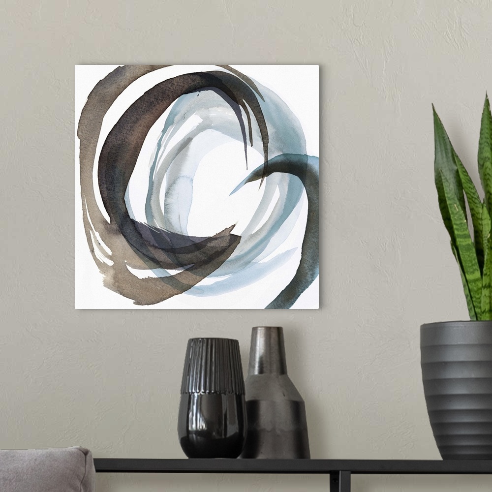 A modern room featuring Contemporary home decor artwork of a watercolor circles against a white background.
