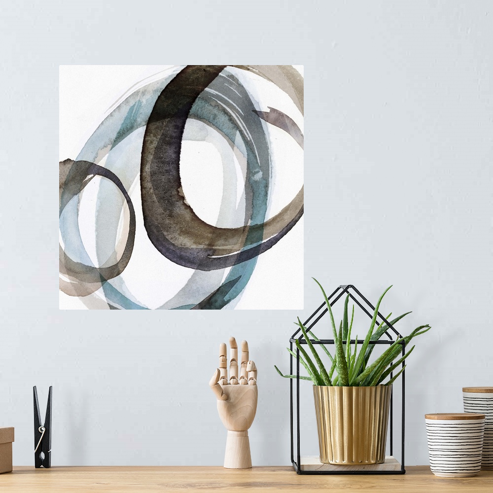 A bohemian room featuring Contemporary home decor artwork of a watercolor circles against a white background.