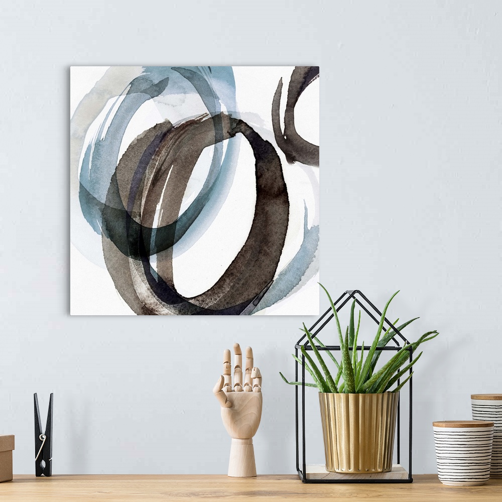 A bohemian room featuring Contemporary home decor artwork of a watercolor circles against a white background.