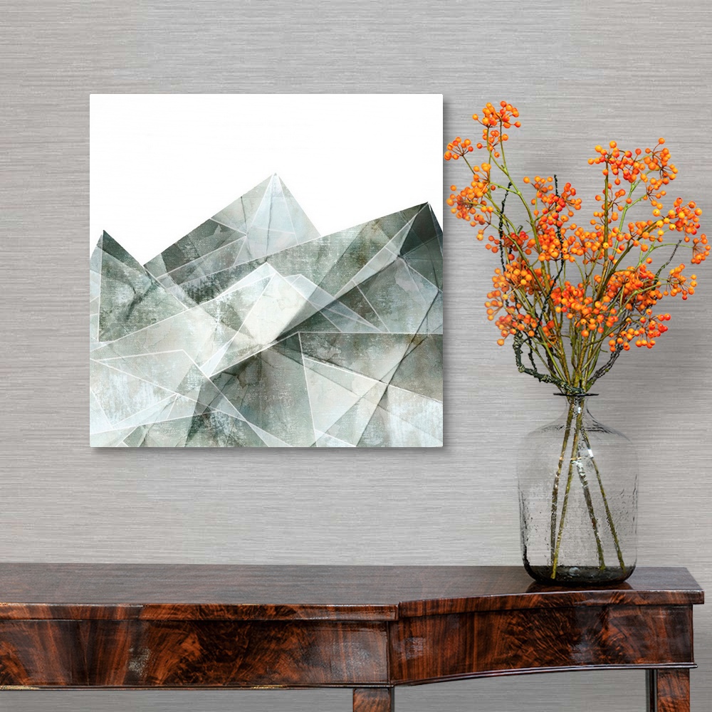A traditional room featuring Square painting of gray abstract geometric shapes.