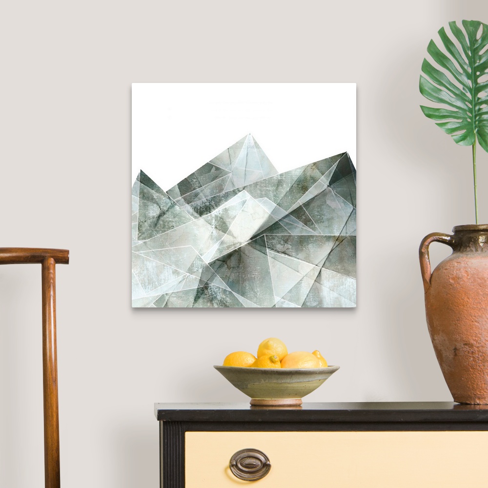 A traditional room featuring Square painting of gray abstract geometric shapes.