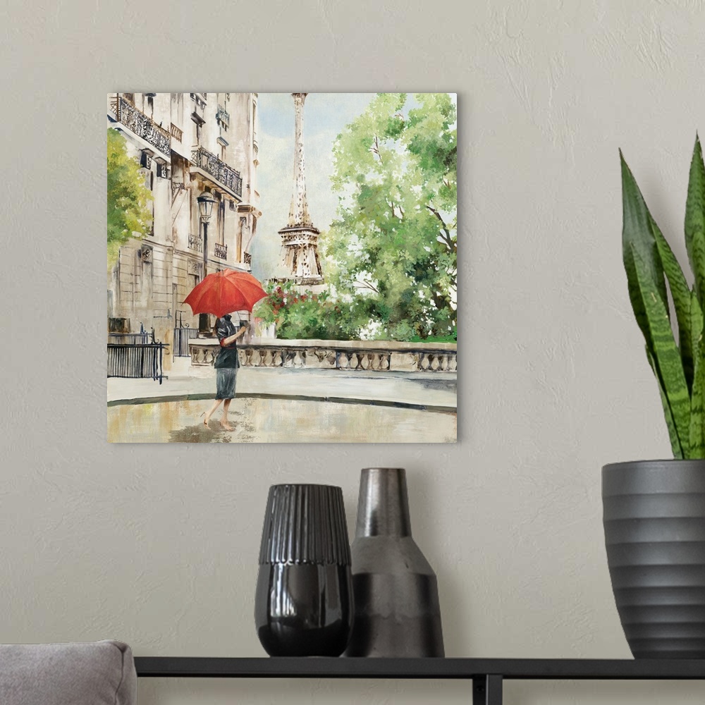 A modern room featuring Contemporary artwork of a person with a red parasol walking near the Eiffel Tower.