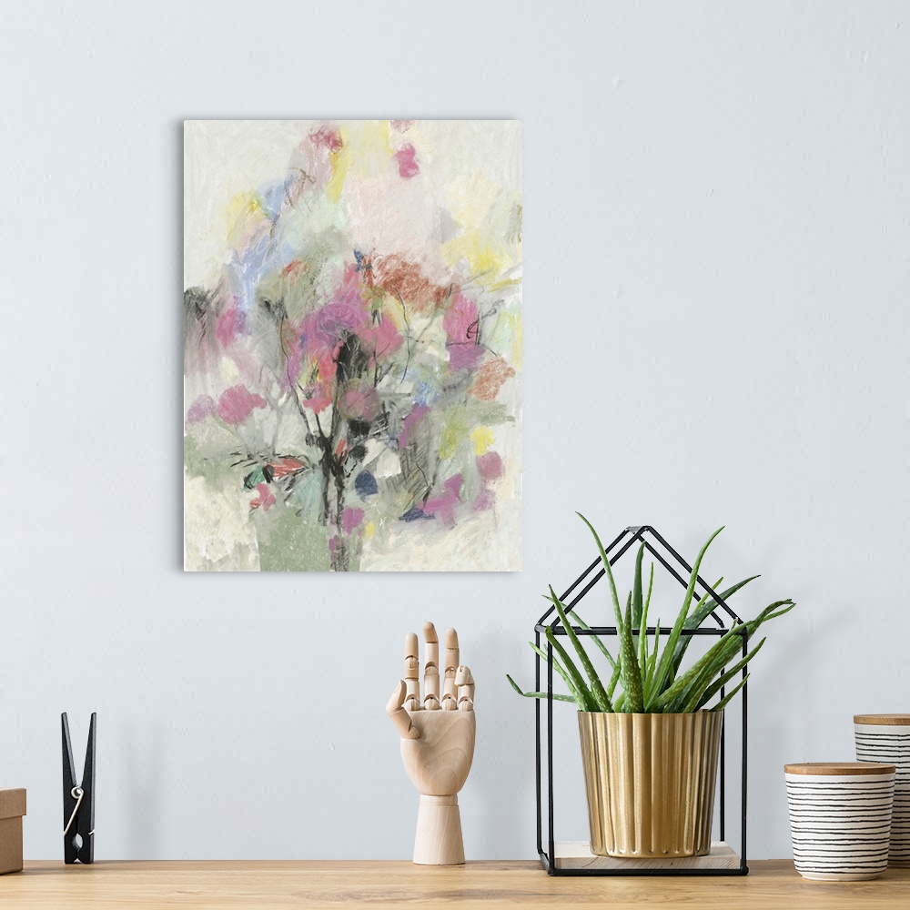 A bohemian room featuring Abstract floral painting in muted pastel colors.