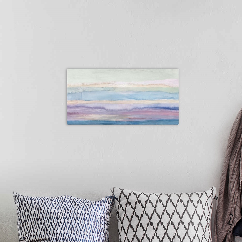 A bohemian room featuring Contemporary abstract home decor artwork using soft watercolors.