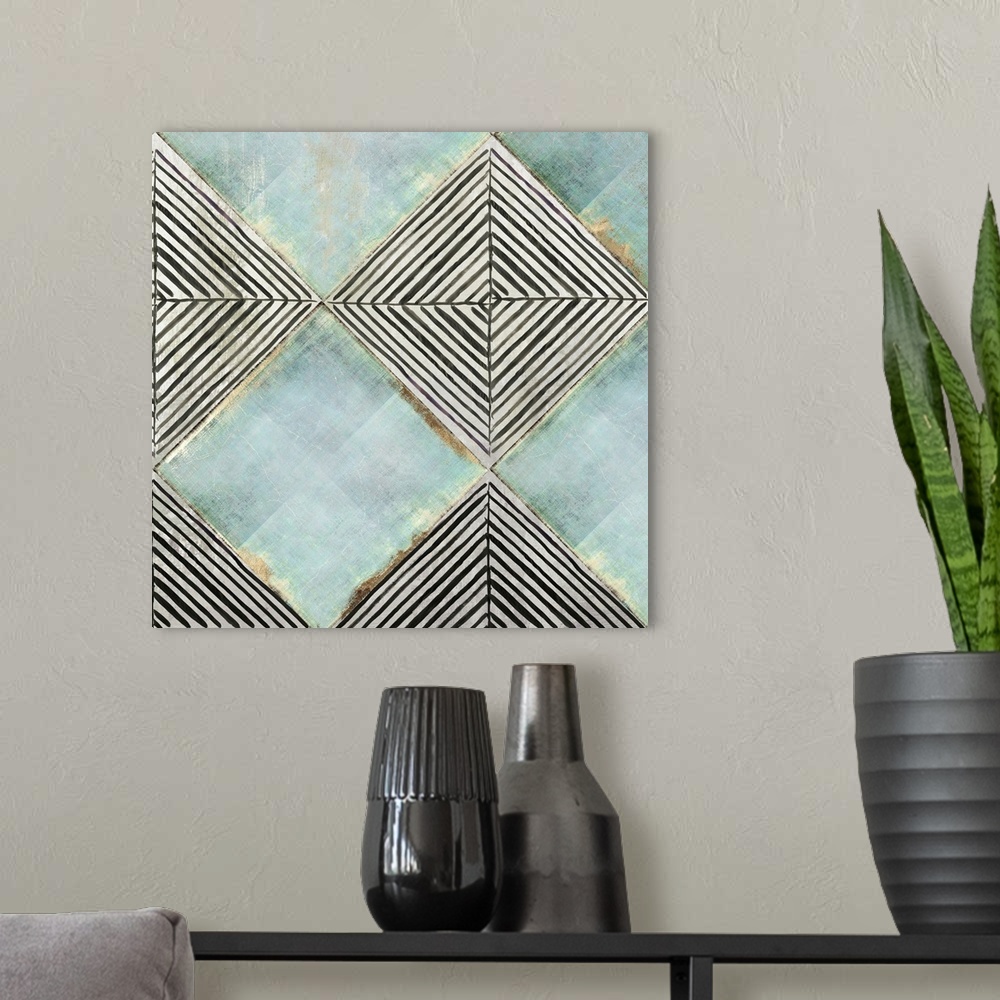 A modern room featuring Square contemporary painting of diamond shapes with geometric lines and gold accents.