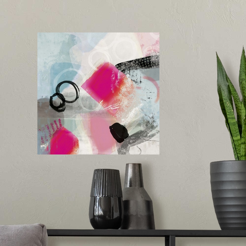 A modern room featuring Abstract painting in shades of pale blue and white with bright pops of pink.