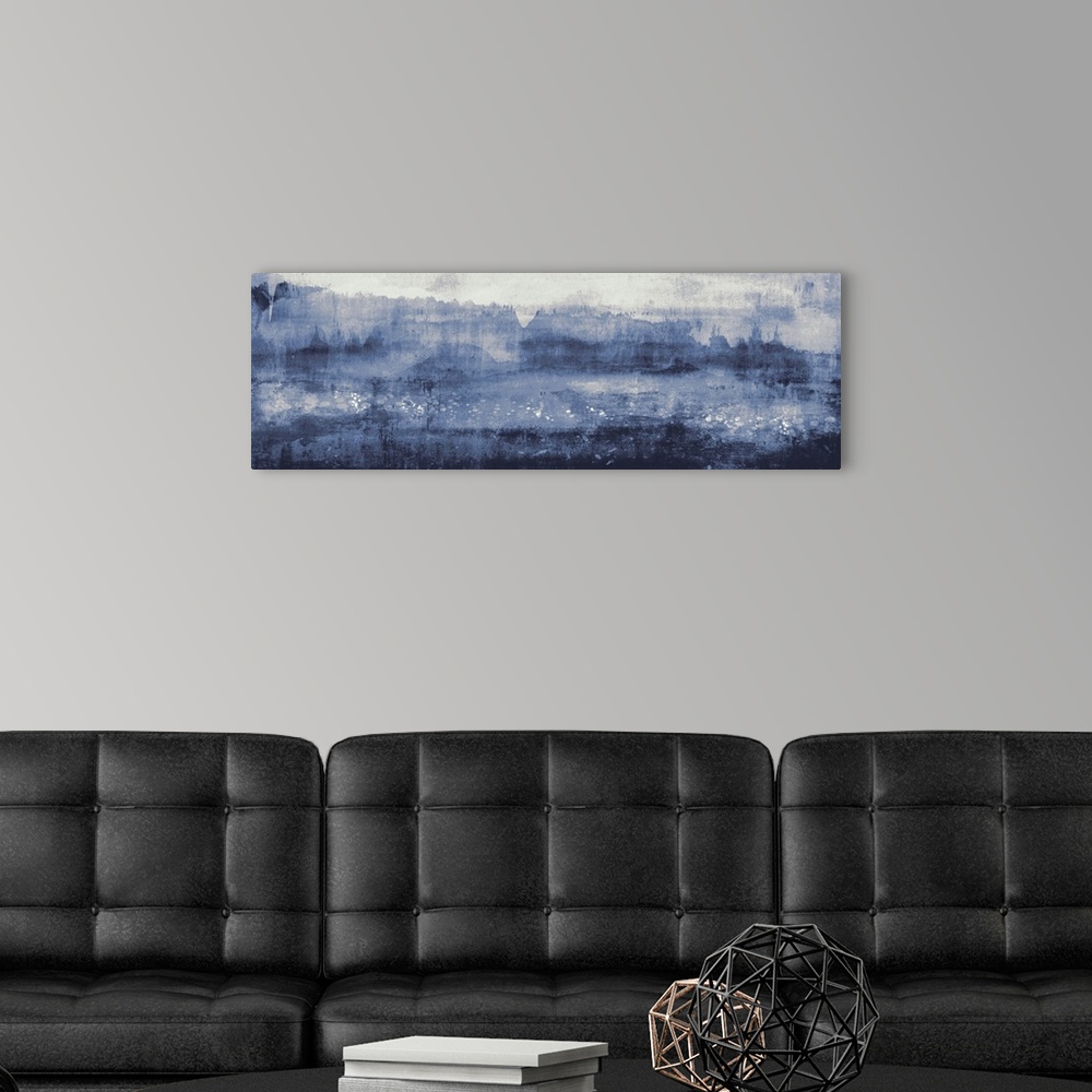 A modern room featuring A large contemporary painting representing a landscape in shades of blue.