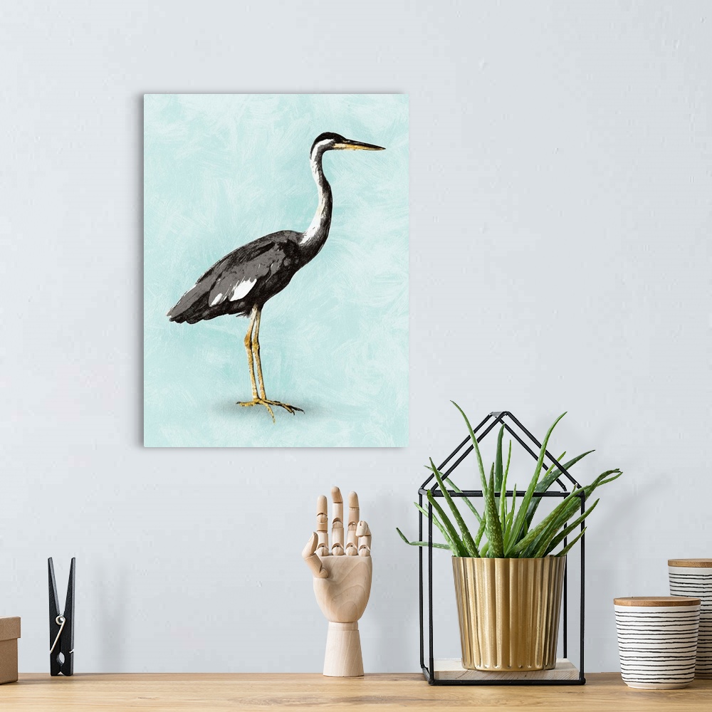 A bohemian room featuring Artwork of a heron on blue.