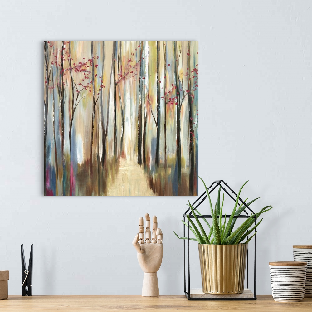 A bohemian room featuring Contemporary home decor artwork of an autumn forest.