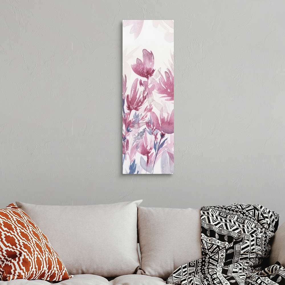A bohemian room featuring Skinny panel watercolor painting of abstract flowers in pink and blue tones on a white background.
