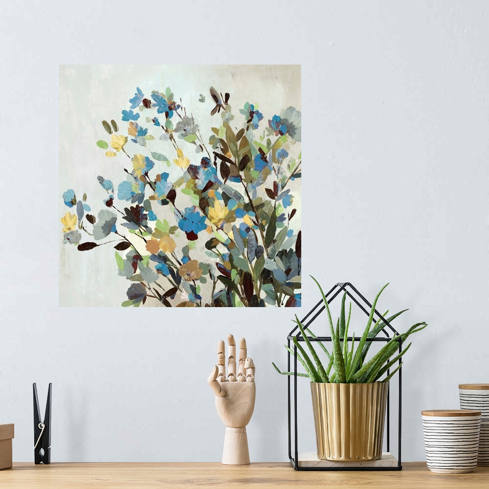 A bohemian room featuring Contemporary artwork of a group of flowers in blue and yellow.