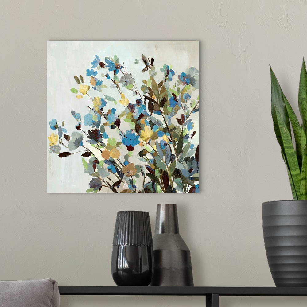 A modern room featuring Contemporary artwork of a group of flowers in blue and yellow.