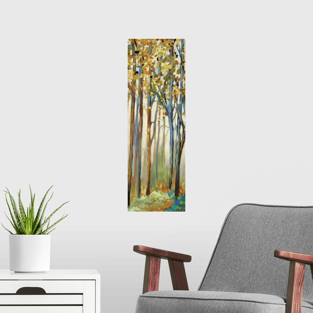 A modern room featuring Contemporary painting of a forest with thin trees and autumn leaves.