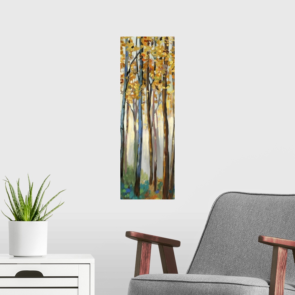 A modern room featuring Contemporary painting of a forest with thin trees and autumn leaves.