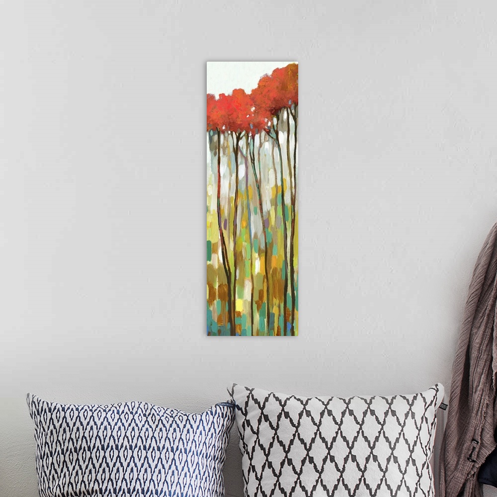 A bohemian room featuring Large panel painting with tall, skinny trees with red leaves on an abstract background.