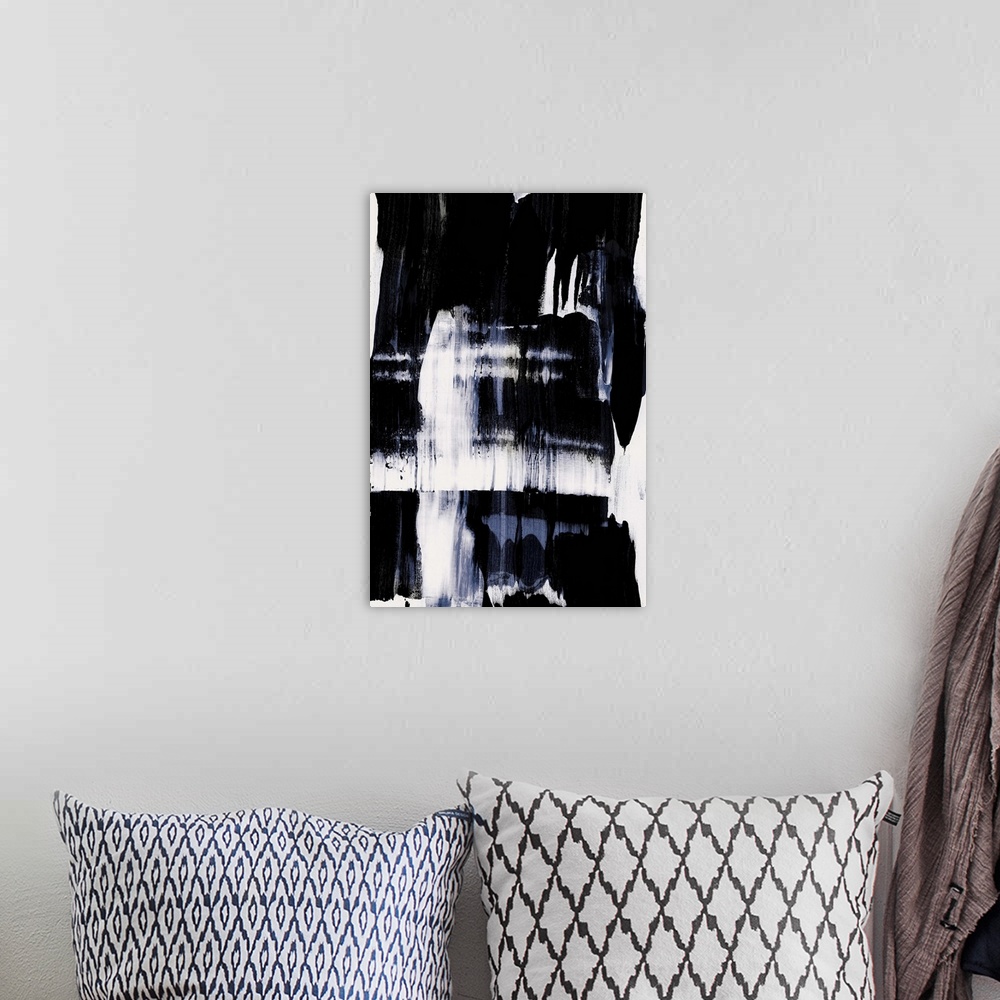 A bohemian room featuring Abstract painting of large black and blue brush strokes on a white background
