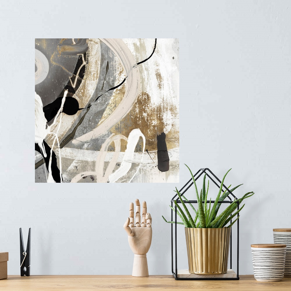 A bohemian room featuring A Square abstract painting featuring shades of brown, black and white.