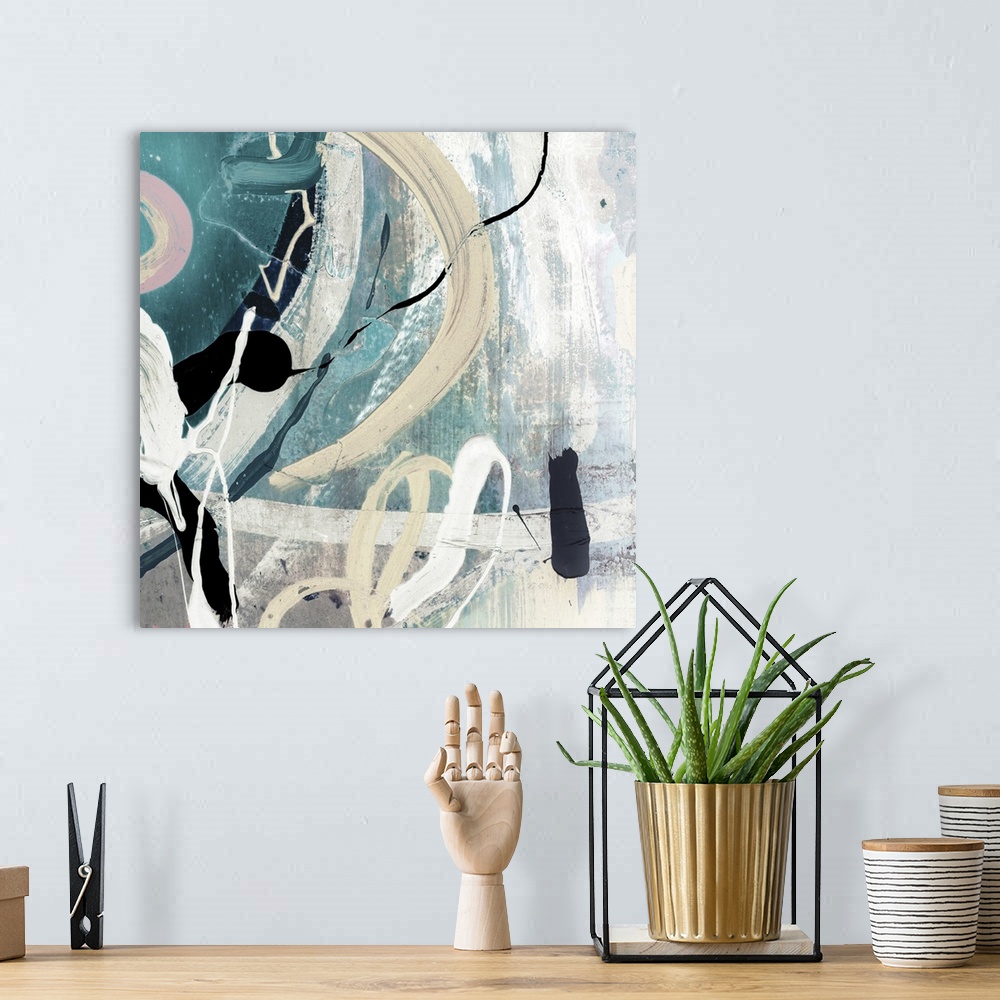 A bohemian room featuring A Square abstract painting featuring shades of blue, black and white.