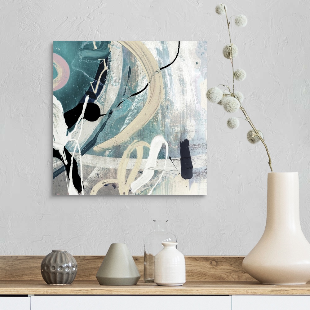 A farmhouse room featuring A Square abstract painting featuring shades of blue, black and white.