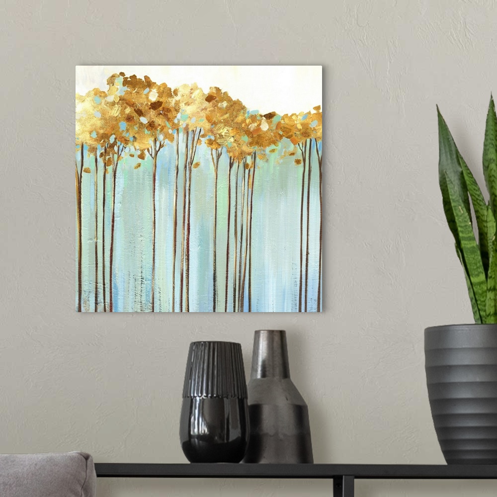 A modern room featuring Contemporary painting of a row of slender trees with golden leaves over pale blue and cream.