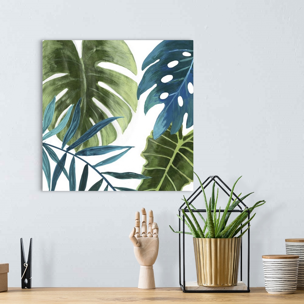 A bohemian room featuring Painting of broad tropical leaves in blue and green.