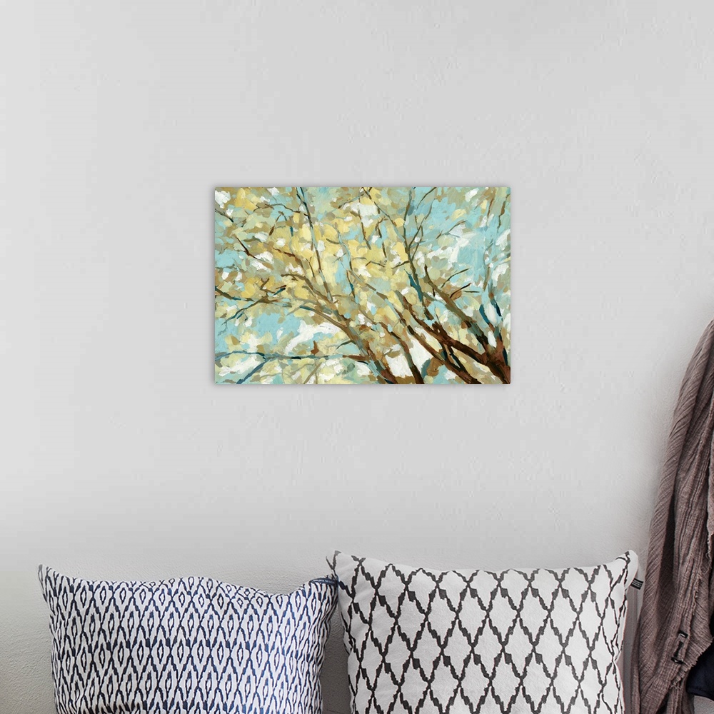 A bohemian room featuring Contemporary painting of branches with yellow and blue leaves.