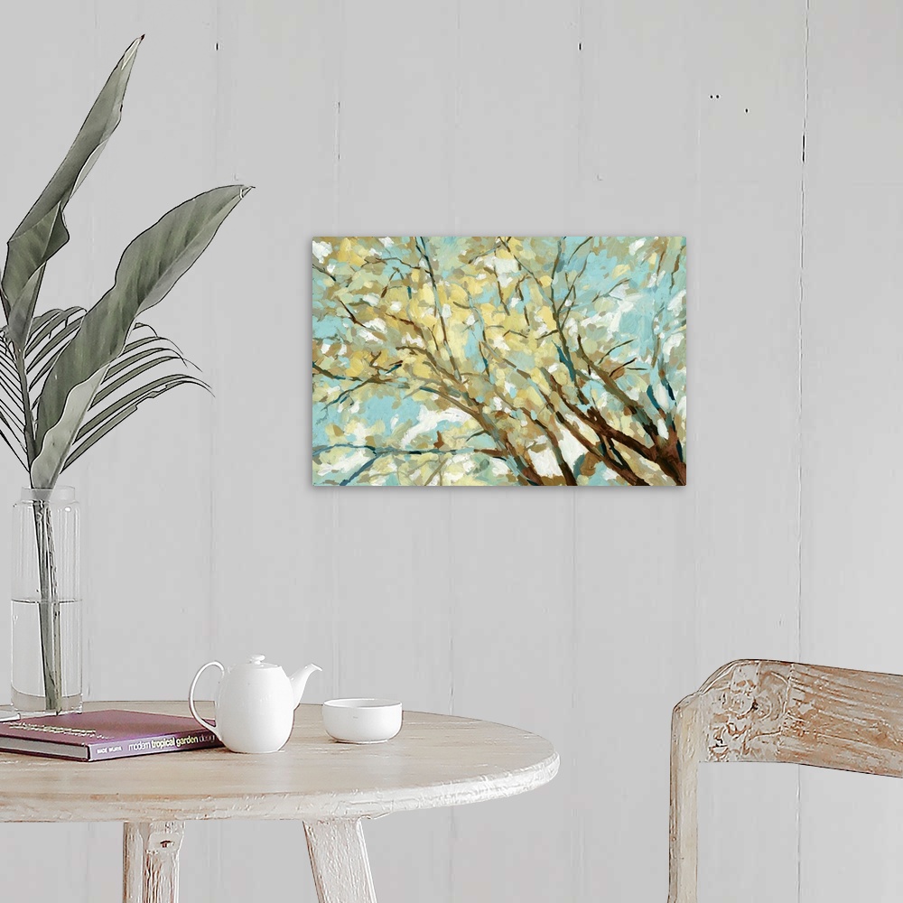 A farmhouse room featuring Contemporary painting of branches with yellow and blue leaves.