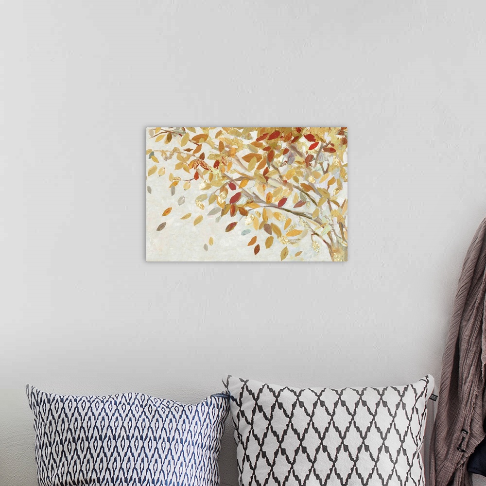 A bohemian room featuring A horizontal painting of a branch full of autumn leaves with gold accents.