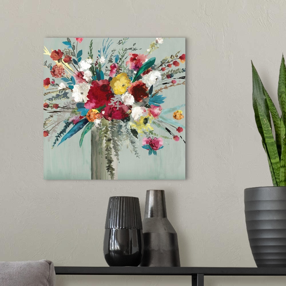 A modern room featuring Contemporary artwork of a vase of brilliantly colored flowers and leaves.