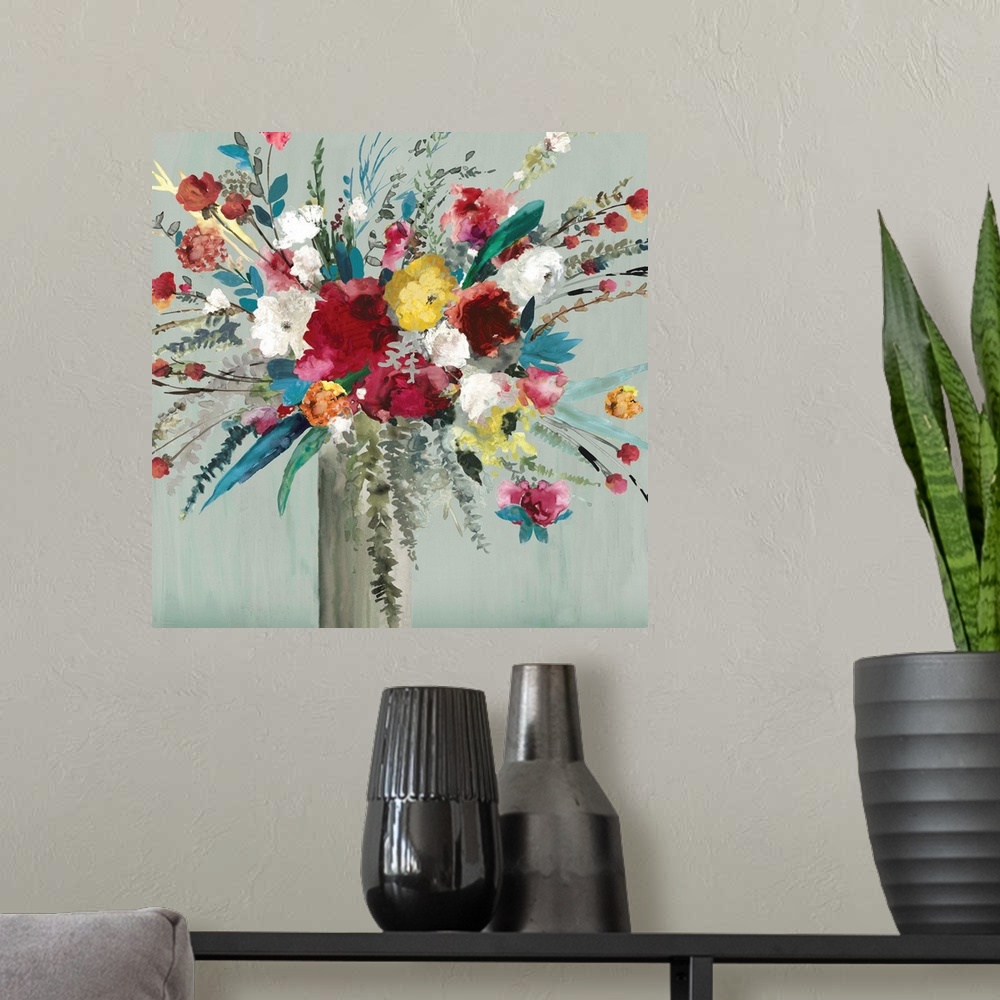 A modern room featuring Contemporary artwork of a vase of brilliantly colored flowers and leaves.