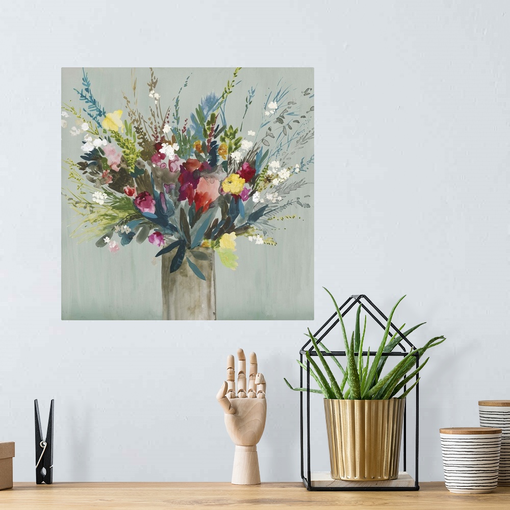 A bohemian room featuring Contemporary artwork of a vase of brilliantly colored flowers and leaves.