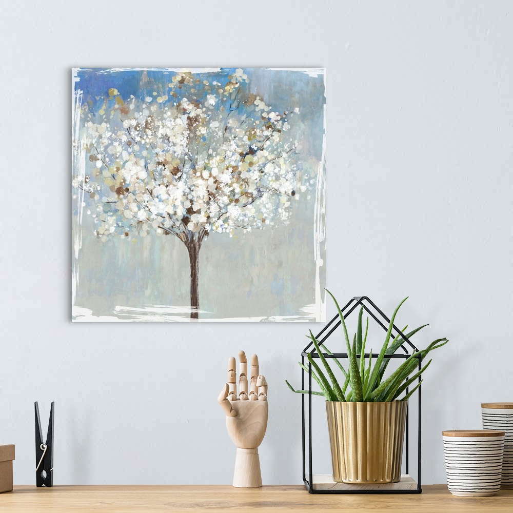 A bohemian room featuring Abstract painting of a tree in winter.