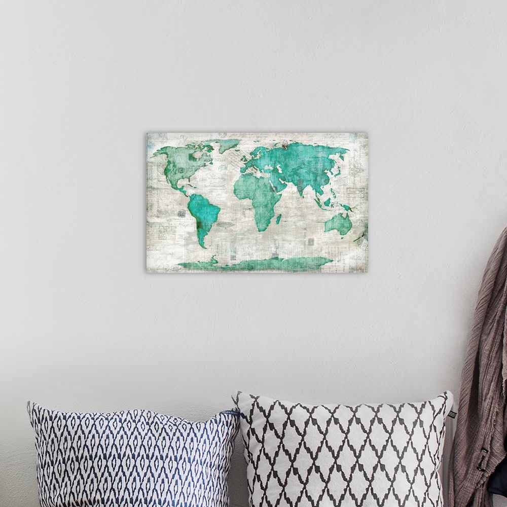 A bohemian room featuring Map of the world in teal with a weathered appearance.