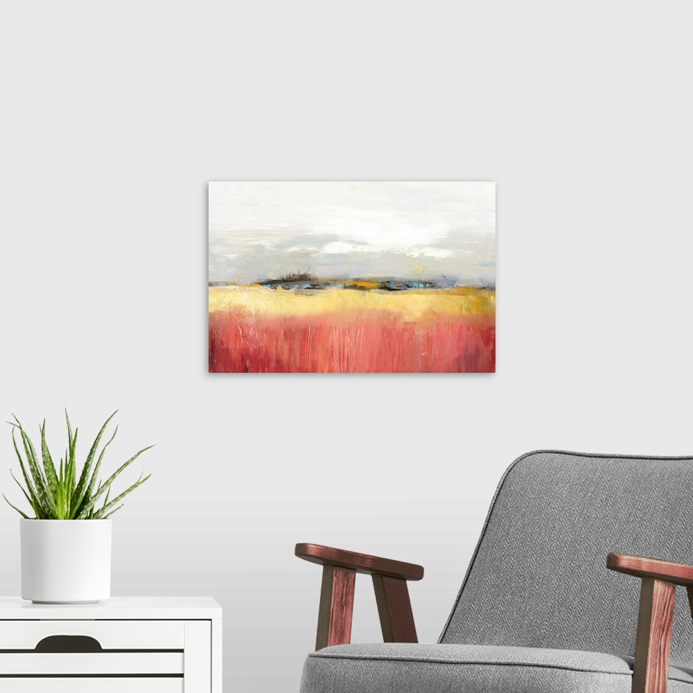 A modern room featuring Landscape painting of a yellow field under an overcast sky.