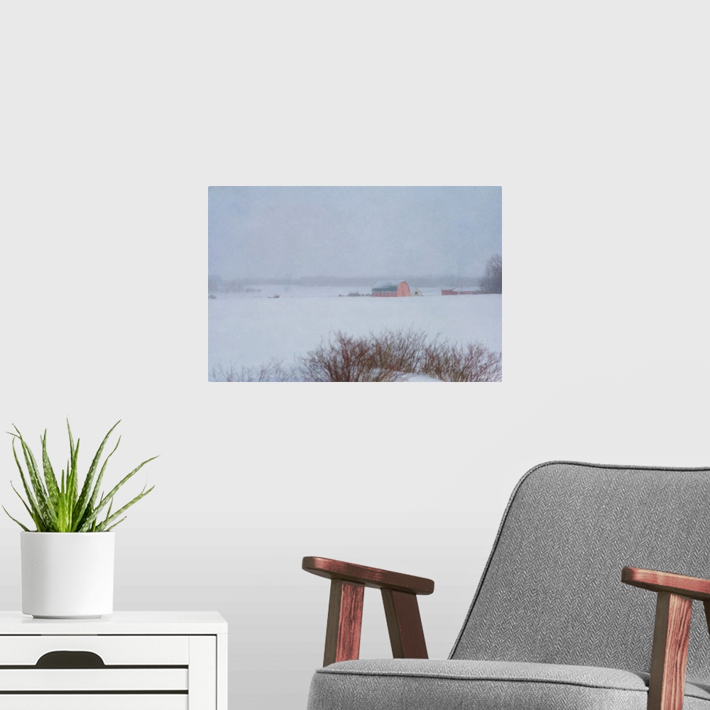 A modern room featuring Pictorial photograph of a red country barn on a farm in winter during a snowstorm.