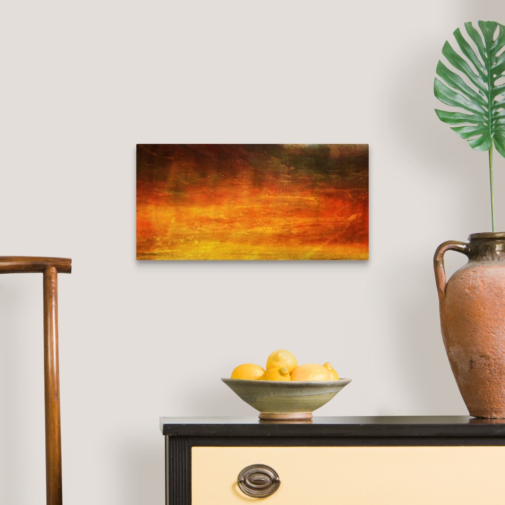 A traditional room featuring A horizontal abstract painting from a contemporary artist that uses warm fiery tones to generate ...