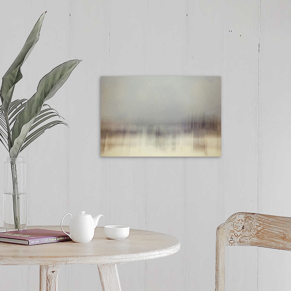 A farmhouse room featuring An impressionist abstract photo of a wilderness forest in winter.