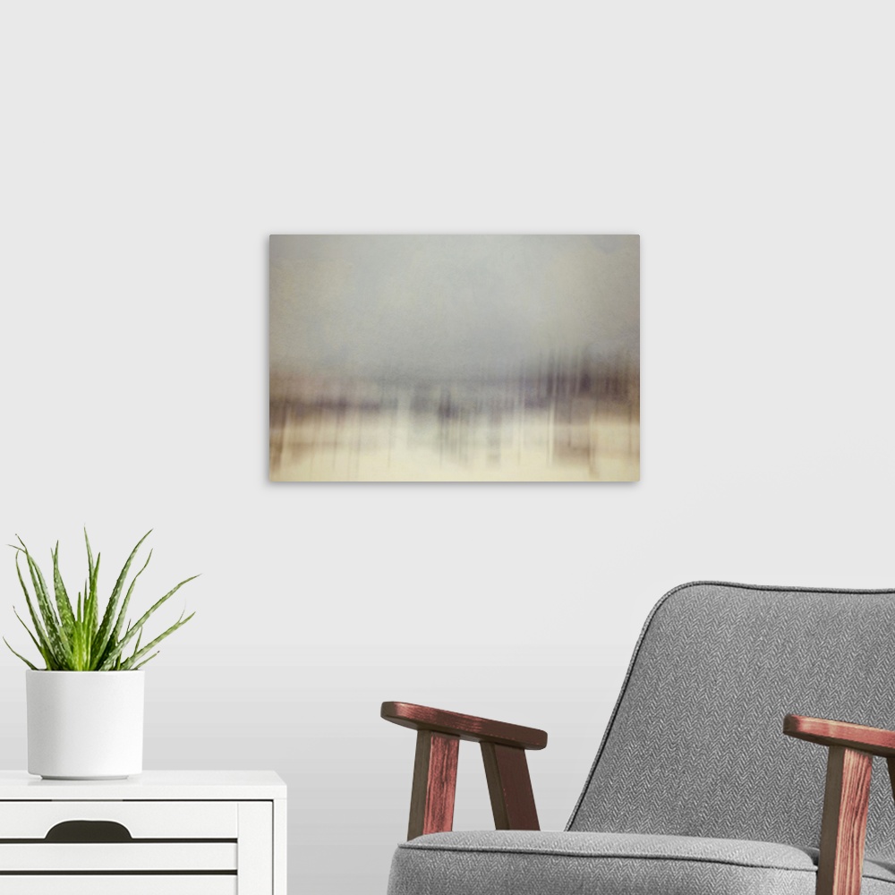 A modern room featuring An impressionist abstract photo of a wilderness forest in winter.