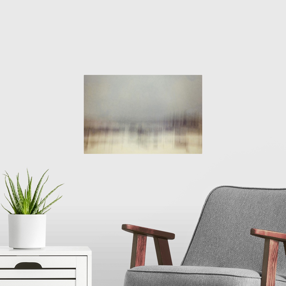 A modern room featuring An impressionist abstract photo of a wilderness forest in winter.