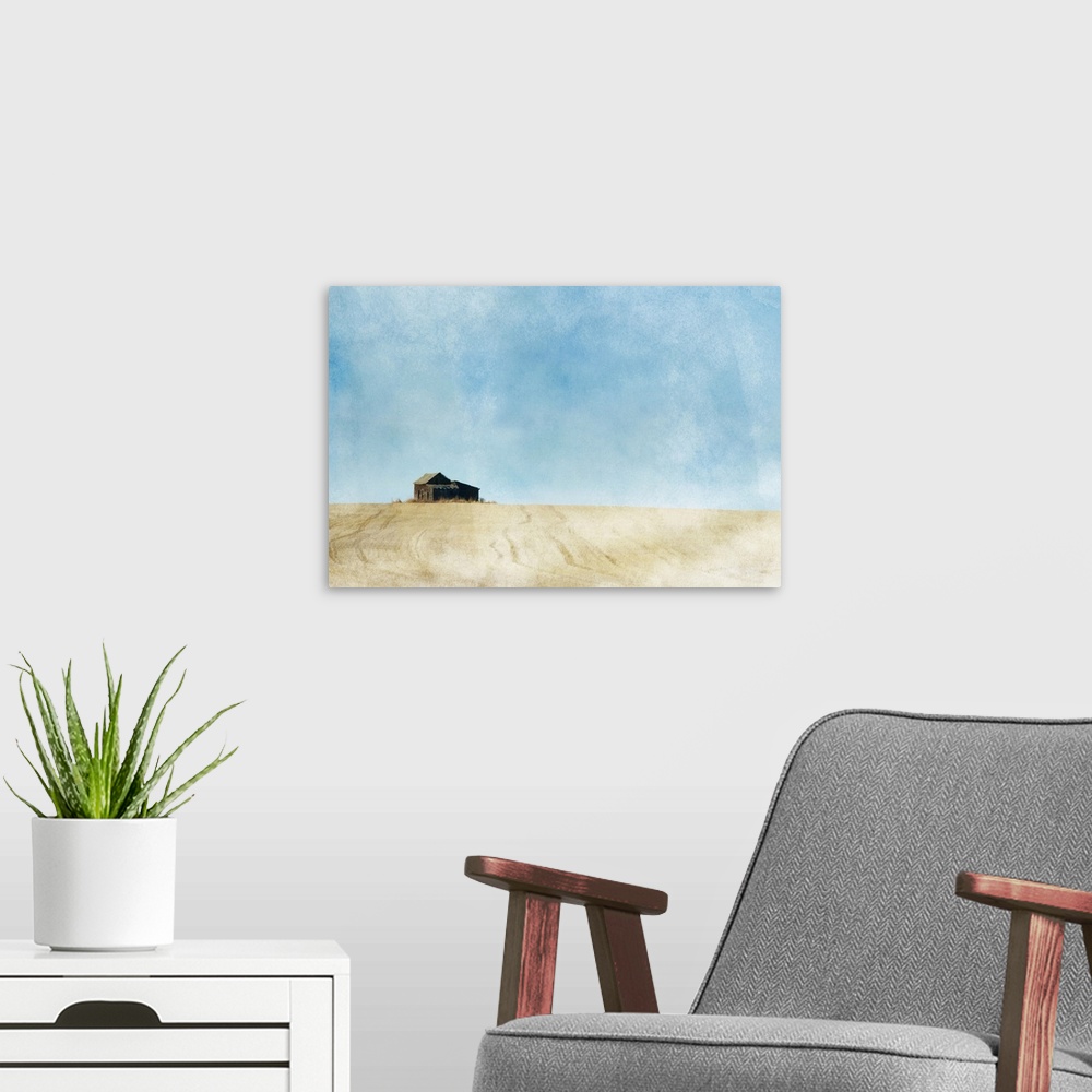 A modern room featuring A painterly photo of a small abandoned farmhouse in the middle of a prairie grain field.