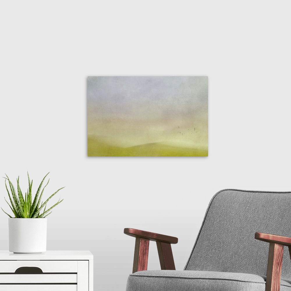 A modern room featuring Painterly abstract blur of green hills, a flock of birds, and a cloudy sky.
